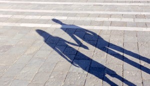 shadow-couple-holding-hands-628x363